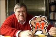 David Guth, an associate professor in journalism at Kansas
University, shows off his Terrapin loyalty. Guth, a Maryland
alumnus, has everything from a class ring to a Terrapin plaque.