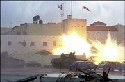 Palestinian leader Yasser Arafat's compound comes under attack in
the West Bank city of Ramallah. Israeli forces have isolated Arafat
in his office and cut off power to the complex.