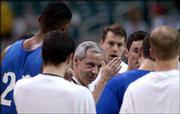 Kansas Coach ROY WILLIAMS talks to his players during the Jayhawks'
final practice prior to today's KU-Maryland game. Friday's
practice, in the Georgia Dome in Atlanta, was open to the public as
part of Final Four festivities.