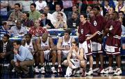 The Oklahoma Bench watches helplessly as Indiana sinks a free throw
late in the game. The Hoosiers halted the Sooners, 73-64, in an
NCAA Final Four semifinal game Saturday at the Georgia Dome in
Atlanta.