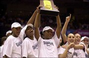 Connecticut players celebrate their 82-70 win over Oklahoma. UConn
completed its season with a 39-0 record on Sunday in San Antonio.
