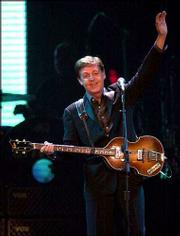 Rock legend Paul McCartney performs the first show of the "Driving
USA" tour in Oakland, Calif. The tour that opened Monday is the
ex-Beatle&squot;s first in nine years.