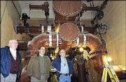 From left, Roger Coffey, director of utilities; Chris Stewart,
assistant director of utilities, and Charlie Gray, plant manager,
stand in the new filter room at the Clinton Lake Water Treatment
Plant, 2101 Wakarusa Drive.