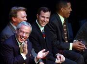 Kansas coaches, from left, Roy Williams, Joe Holladay, Ben Miller
and Neil Dougherty laugh at comments made by Max Falkenstien during
the Jayhawks' award ceremony.