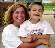 Mandy commons fought Pittsburg school officials to ensure her son,
Bryce Commons, got what she considered to be a quality education.
Now Mandy Commons is one of four Kansas representatives for a
national organization called Unlocking Autism.