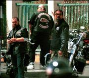 Bikers wearing Hells Angels colors gather in a parking lot at
Gretchen's Inn on U.S. Highway 95 in Bullhead City, Ariz., after
other Hells Angels members were involved in a shootout at Harrah's
casino in Laughlin, Nev. Rival motorcycle gangs armed with guns and
knives clashed at the casino early Saturday, leaving three dead and
at least 12 wounded.