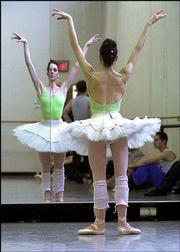 Ballet companies nationwide are employing edgy programs and
marketing campaigns in an effort to build younger audiences. The
Pennsylvania Ballet Company's campaign features ballerina Amy
Aldridge, seen here during practice.