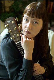 Singer-songwriter Suzanne Vega is promoting a new collection of
folk songs by various artists about the Sept. 11 attacks. "Vigil"
is available at amazon.com.