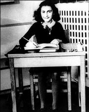 ANNE FRANK, shown in an undated file photo, kept a diary while her
family hid from the Nazis in Amsterdam, Netherlands, during World
War II. Biographer Carol Ann Lee has published a new theory saying
a former business associate of Frank's father tipped off the
Franks' hideout to the Nazis.