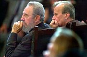 Cuban President Fidel Castro listens to a discussion between former
President Jimmy Carter and university students in Havana, Cuba.
Despite Carter's overtures, the United States does not plan to ease
trade restrictions for Cuba.