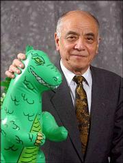 Yoshimitsu Banno, a Japanese film director, was in Lawrence on
Friday, visiting with Lawrence screenwriter and business partner
Ollie Hall. But he's probably best-known in this country for
directing the 1972 "Godzilla Versus the Smog Monster," which was
ranked one of the 50 worst movies of all time by a panel of film
critics.