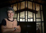 The Rev. Sherry Schultz, pastor of Unity Church of Lawrence, is
moving her congregation into a building at Ninth Street and
Madeline Lane that has been the home of the Lawrence Wesleyan
Church.