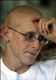 Wingert pauses to recall what she considers her lowest point during
her cancer treatments. The need to raise her children and her anger
are what has gotten her through the hard times.
