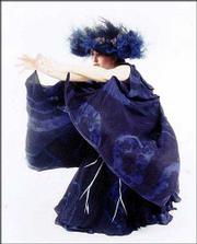 A member of the Prairie Wind Dancers portrays a storm cloud in
"Prairie," a work that combines the poetry of Carl Sandburg and the
costume designs of John Steuart Curry.