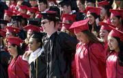 Lawrence High School&squot;s Class of 2002 sings the school song as the
newly "emancipated" graduates celebrate the end of their high
school careers. Commencement ceremonies were Sunday afternoon at
Kansas University&squot;s Memorial Stadium.