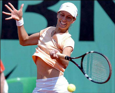 Argentina's Clarisa Fernandez returns a forehand to Belgium's ...