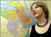 Deborah Gerner, a Kansas University political science professor, is
traveling with a group of Quakers to the Mideast study the
Israeli-Palestinian conflict. Gerner just returned from a trip to
Ramallah, where she was one of a dozen scholars and journalists to
interview Palestinian leader Yasser Arafat.