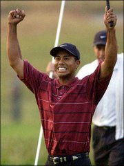 Tiger Woods, WHO wrapped up a resounding victory in the U.S. Open
on Sunday, now has won eight major championships at the age of 26.
He's won two majors this year.