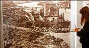 A mural in the Hiroshima peace memorial museum shows a devastated
city with few buildings remaining. The building to the right, once
a Japanese government exhibition hall, is now called the A-Bomb
Dome and stands on the museum property.