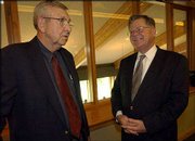Kansas Board of Regents Vice Chairman Jack Wempe of Lyons, left,
and Chairman Clay Blair, Olathe, visit during a reception at
Alvamar Country Club, 1800 Crossgate Drive. A dinner in honor of
outgoing regents Blair, Floris Jean Hampton, Dodge City, and Steve
Clark, Wichita, was Wednesday after a meeting of the board in
Topeka.