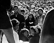 Black and white Youths gather for a rally in front of Strong Hall
at Kansas University in this file photo from December 1970. Some
participants carried posters of Rick Dowdell, who was killed that
July.