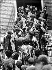The casket of Donald Rick Dowdell, 19, is carried from the St. Luke
A.M.E. Church, 900 N.Y., in this July 23, 1970, file photo. Dowdell
was fatally shot by police after a car chase. The front two
pallbearers at left are Dowdell's brothers, Randy and Stephen
Dowdell, and the fourth man back on the left side is Duane Vann,
former president of the Kansas University Black Students Union.