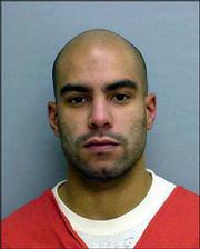 Damien C. Lewis, 22, was charged Thursday in Douglas County
District Court with capital murder and first-degree murder in the
shooting deaths of George "Pete" Wallace and Wyona Chandlee in
their home at 1530 Learnard Ave. Lewis was arrested early Wednesday
in the 1600 block of Haskell Avenue after a Tuesday night robbery
in Edgewood Park.