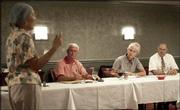 Consultant Carol Nalbandian speaks to city commissioners, from
left, Marty Kennedy, Sue Hack and Jim Henry. The city commission
began a retreat Friday to discuss their hopes and fears for the
community and what they want to accomplish.