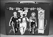 This vinyl lunchbox had a matching metal thermos bottle. The
complete box, picturing Captain Kangaroo, Mr. Green Jeans,
Grandfather Clock and Dancing Bear, sold for $200 last year.