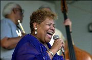 Singer Myra Taylor, a link to the heyday of Kansas City jazz,
performs at Washington Square Park in Kansas City, Mo. Taylor, who
released a CD last year, is celebrating two top awards from Living
Blues magazine.