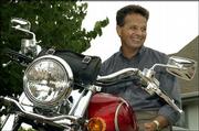 Dan DePardo, a research engineer at Kansas University's Information
and Telecommunications Technology Center, enjoys a variety of
outdoor activities, including taking his jet ski to Clinton Lake,
gardening, landscaping his yard and especially riding his Kawasaki
Vulcan 1500 Classic Fi motorcycle.
