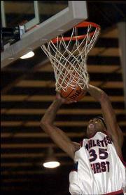 J.R. Giddens dunks during an AAU tournament game. A Kansas
University recruit, Giddens had 32 points in a second-round game
Saturday in Shawnee.
