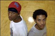 Kansas basketball recruits J.R. Giddens, left, and Jeremy Case say
they're tickled they are playing together this summer and will play
together at KU. The two Oklahoma preps participated in the Price
Chopper/Kansas City Prep Invitational Basketball Tournament on
Saturday in Shawnee.