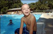 Camp Determination is designed specifically for children with
autism and Asperger's syndrome. Andrew Ellis, 9, Lawrence, was one
of the participants this summer. The camp is often the children's
first time away from home.