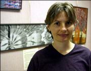 Lawrence artist Lora Jost's work reflects the stories she collected
during interviews with 42 farmers, farm family members and farm
advocates in Kansas. Her work is on display at the National
Agricultural Center and Hall of Fame in Bonner Springs.