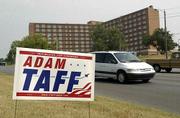 City inspectors were out pulling up campaign signs today that were
violating the city's sign ordinance, which doesn't allow them to be
placed in medians or along the right-of-way. This sign was in the
public right-of-way along Kansas University property near 19th and
Iowa streets.