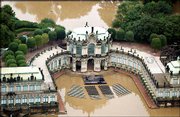 The Zwinger Castle in Dresden, Germany, is flooded with water from
the Elbe River. The castle holds a collection of Renaissance
paintings.