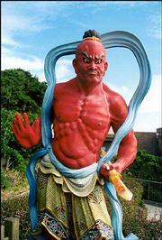 Morley captures the colorful beauty of a classical Japanese statue
at Enoshima Island in Japan in this photograph.
