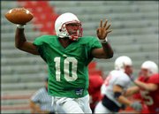 Nebraska quarterback Jammal Lord throws a pass during an intrasquad
scrimmage in Lincoln, Neb. Nebraska and Florida State begin the
season in the uncomfortable position of defending their reputations
instead of a championship.