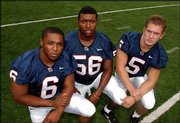 Linebackers, from left, Leo Etienne, Greg Cole and Banks Floodman,
say they expect to lead the Jayhawks' defense this season.