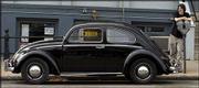 Ben Kappen's mint-condition, 41-year-old Volkswagen Beetle attracts
a lot of attention on Lawrence streets. He's invested about $12,000
fully restoring the car.
