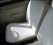 The inside of Kappen's VW Bug shows no trace of its age. The
interior sports factory-original seats re-covered in white vinyl.