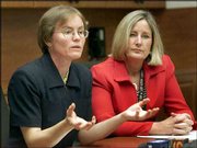 Dr. Mary Jo Trepka, left, epidemiology director for the Miami-Dade
County Health Department, and Nancy Humbert, deputy director of the
health department, speak to the press at a news conference in
Miami. Health officials revealed Saturday they were investigating
the possibility that a 63-year-old man contracted West Nile virus
from a heart transplant or a blood transfusion.
