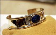 A silver and lapis bracelet by David Nieto, Lawrence, is among the
works in the Lawrence Indian Arts Show.