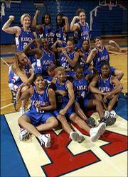 Kansas University's women's basketball players flex as they pose
for a team picture. Hamming it up for the picture at Tuesday's
media day were: front row from left, Ebony Haliburton, Sereeta
Jones, Brandi McGinest and Crystal Kemp; middle row from left,
Leila Mengila Beachem, Aquanita Burras, Erica Hallman and Blair
Waltz; and, back row from left, Stacey Becker, Alicia Rhymes,
Nichelle Roberts and Valerie Migicovsky.