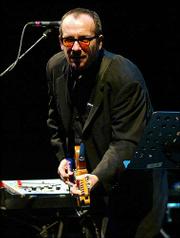 Elvis Costello and the Imposters performed for avid fans Wednesday
night at Kansas City's Midland Theatre.