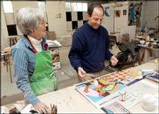 Pam Loewenstein, left, and her son Dave Loewenstein share a studio
at 411 E. Ninth St. Pam is a potter and her son is a muralist. Both
artists will have their works on display at the ArtWalk, the annual
self-guided tour, on Saturday and Oct. 27.