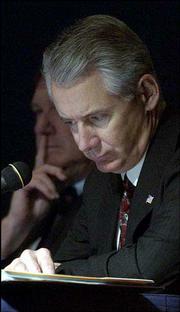 Gov. Bill Graves joined three former Kansas governors for a
roundtable discussion on the bleak Kansas economy and state budget
problems. Graves and former governors Mike Hayden, visible at left,
John Anderson Jr. and William Avery participated Thursday in the
roundtable panel during the 2002 Kansas Economic Policy Conference
at Kansas University.