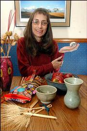 Jan Biles, winner of a Special Recognition Phoenix Award, covered
the arts for nearly 7 1/2 years as the Journal-World arts editor.