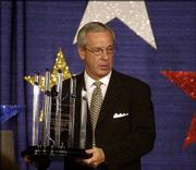 Kansas coach Roy Williams displays his hardware. Williams was
honored by basketball greats like Dean Smith and Norm Stewart
during the Jewish Community Center of Kansas City's fund-raiser
Sunday night at the Downtown Marriott.